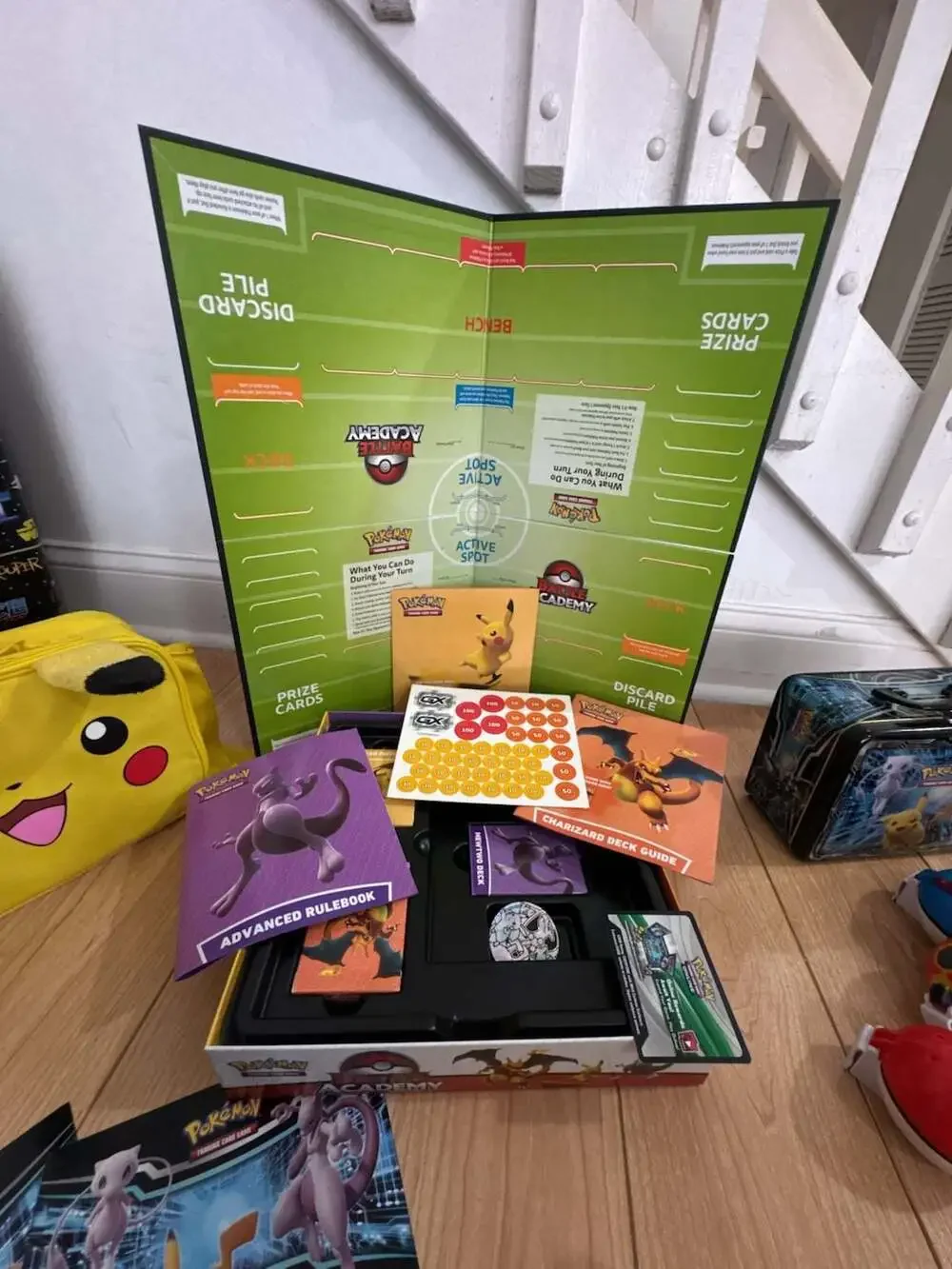 Pokémon BUNDLE Battle Academy Board Game with Pikachu Bag, Tin, and Accessories
